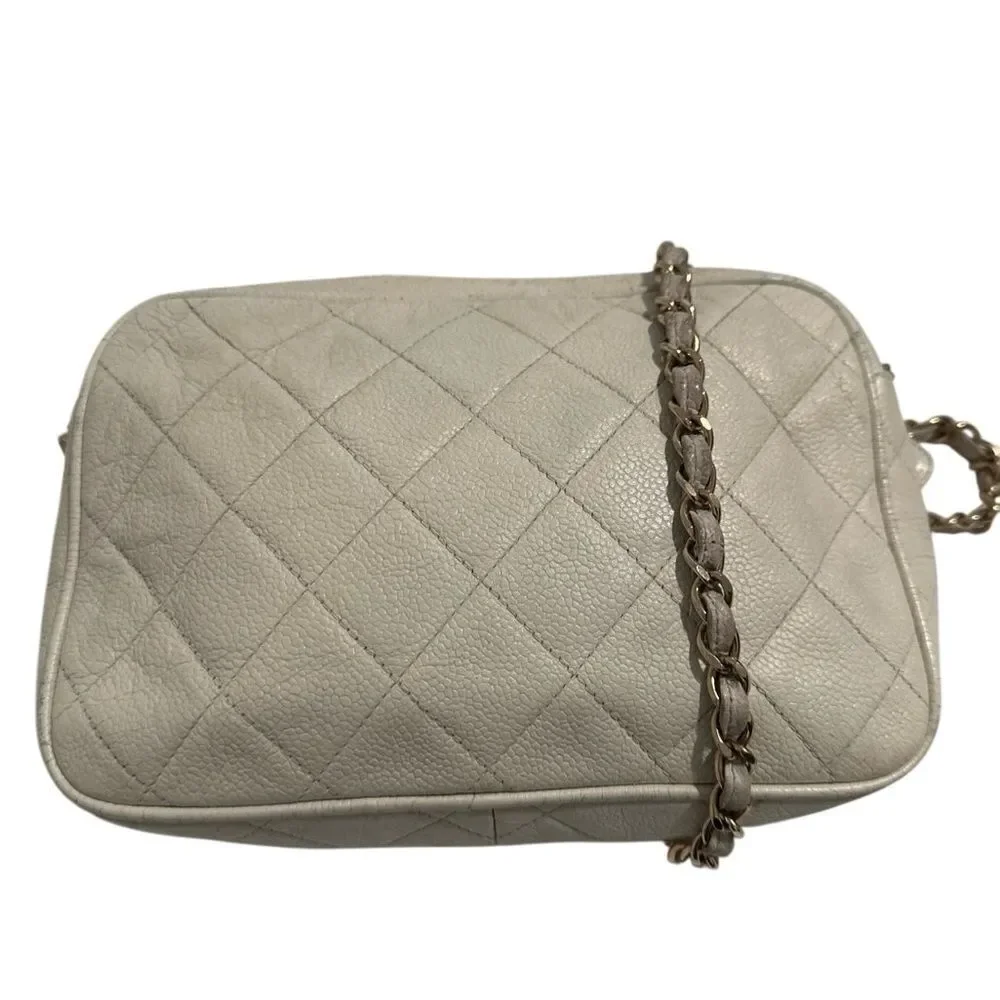 Chanel beige quilted gold tone leather crossbody bag